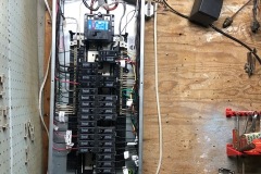 Before during and after of an electrical circuit breaker panel upgrade with a generator setup